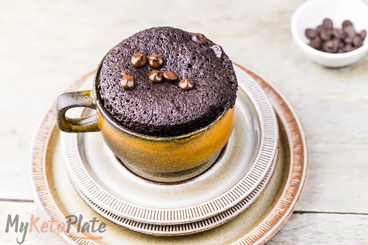 keto chocolate cake in a mug made in the microwave
