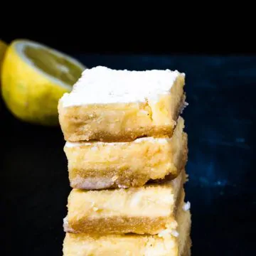 Keto Lemon Bars are a delightful sugar-free recipe with a wonderful balanced sweet and tangy flavor. You’ll love the bright yellow color, the melt-in-your-mouth shortbread almond crust, and the lusciously thick lemon filling.