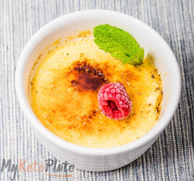 A rich and creamy vanilla custard with a crispy caramelized top, served in a small white dish.