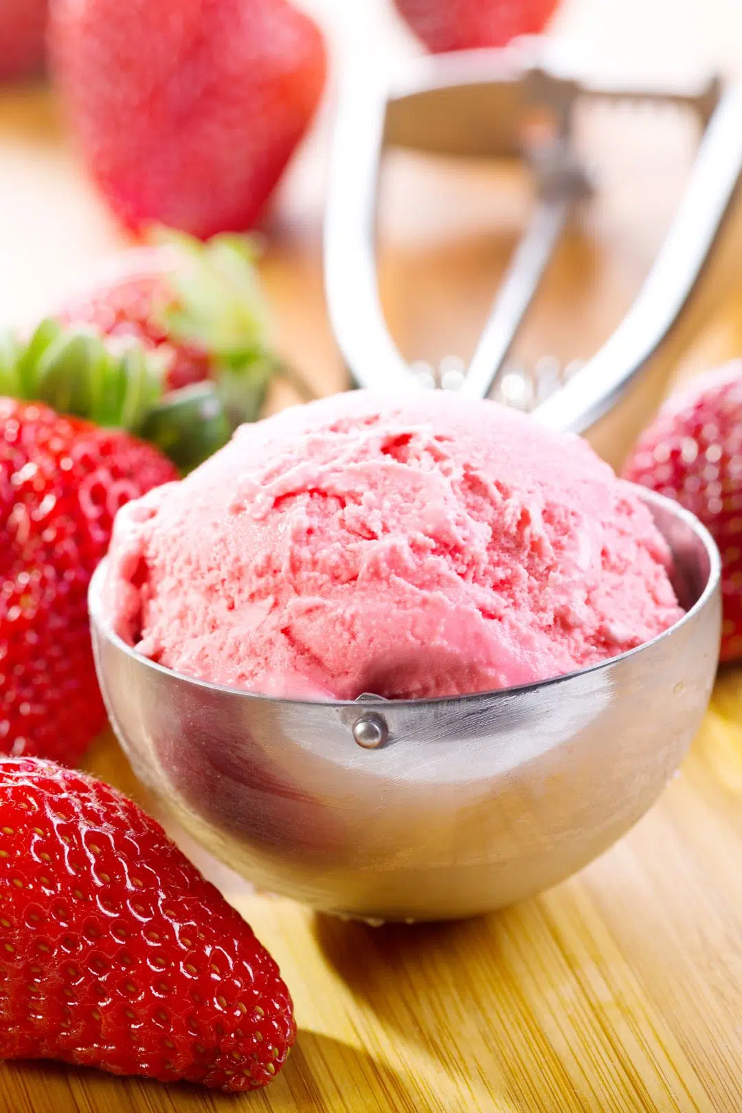 keto strawberry ice cream in a scoop