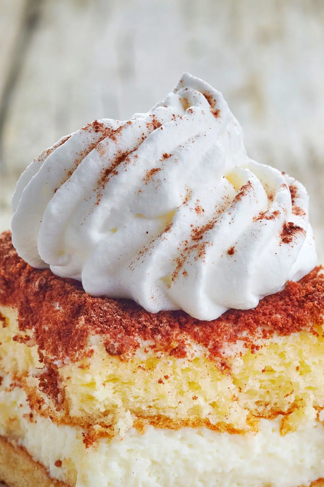 low carb keto whipped cream on top of keto tiramisu cake