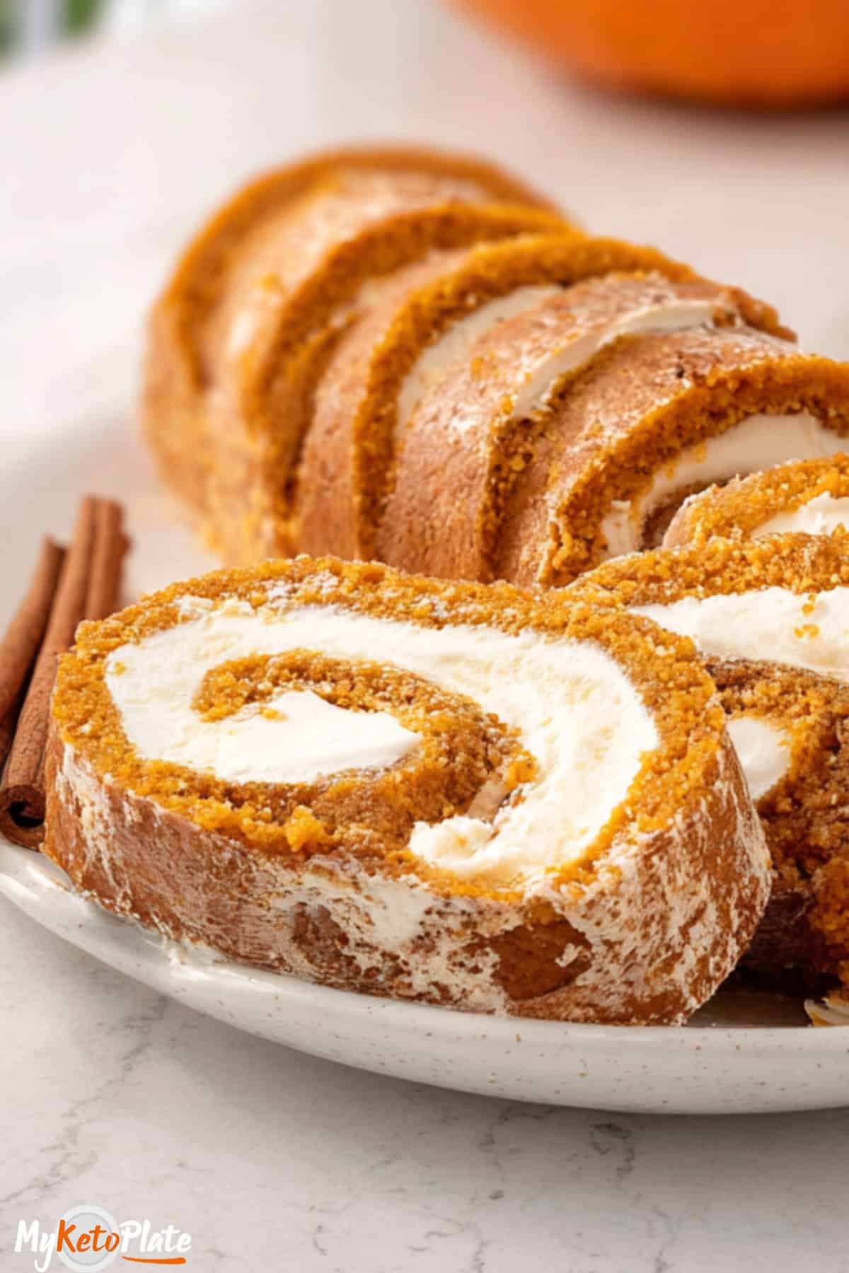 Ultra-moist pumpkin cake with spiced cream cheese filling, showing fine crumb and rich creamy center.